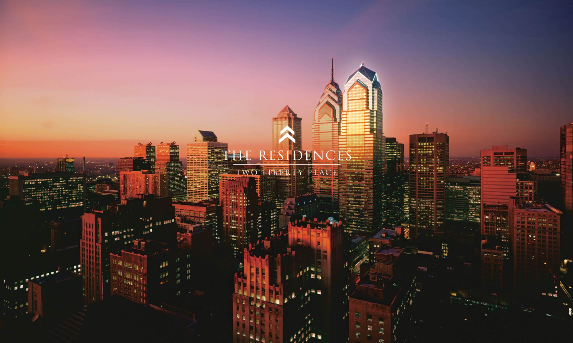 Philadelphia skyline with Two Liberty logo
